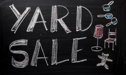 Yard sale words on a blackboard
